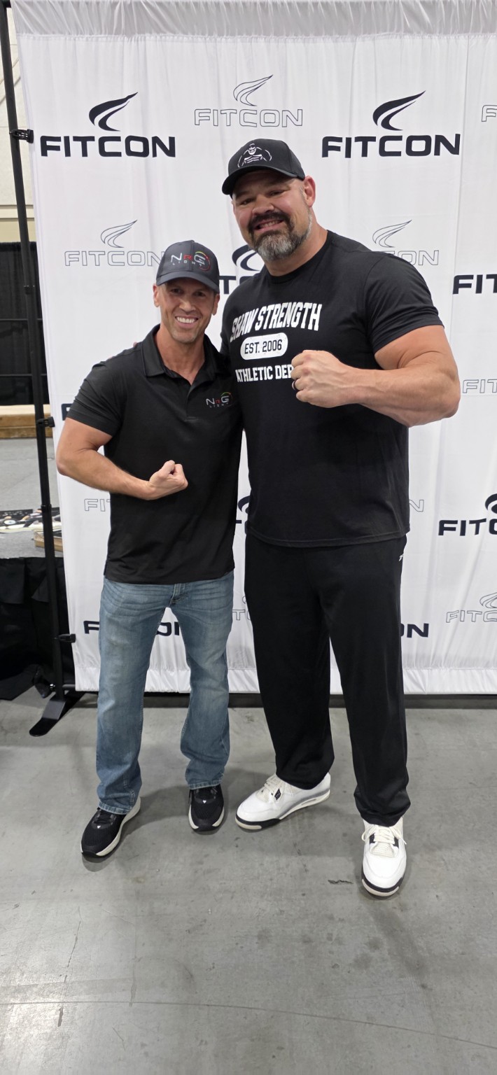 NrG Light founder Allen Evans with Brian Shaw at Utah FitCon in May 2026