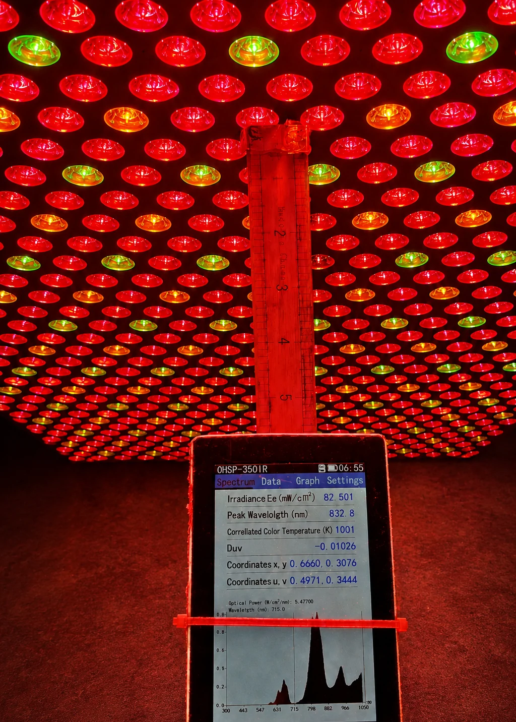 OHSP-350IR spectrometer measuring NrG-PHOENIX irradiance at 6 inches and displaying 82.501 milliwatts per square centimeter